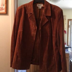 Blazer button up. Leather and polyester.